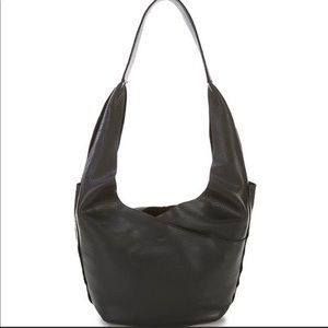 Hammer Tom Snap Studded leather hobo.